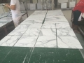 Tuiles de marbre italien calacatta or