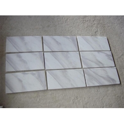 white volakas marble wall panel