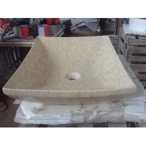 beige color marble sink and basin